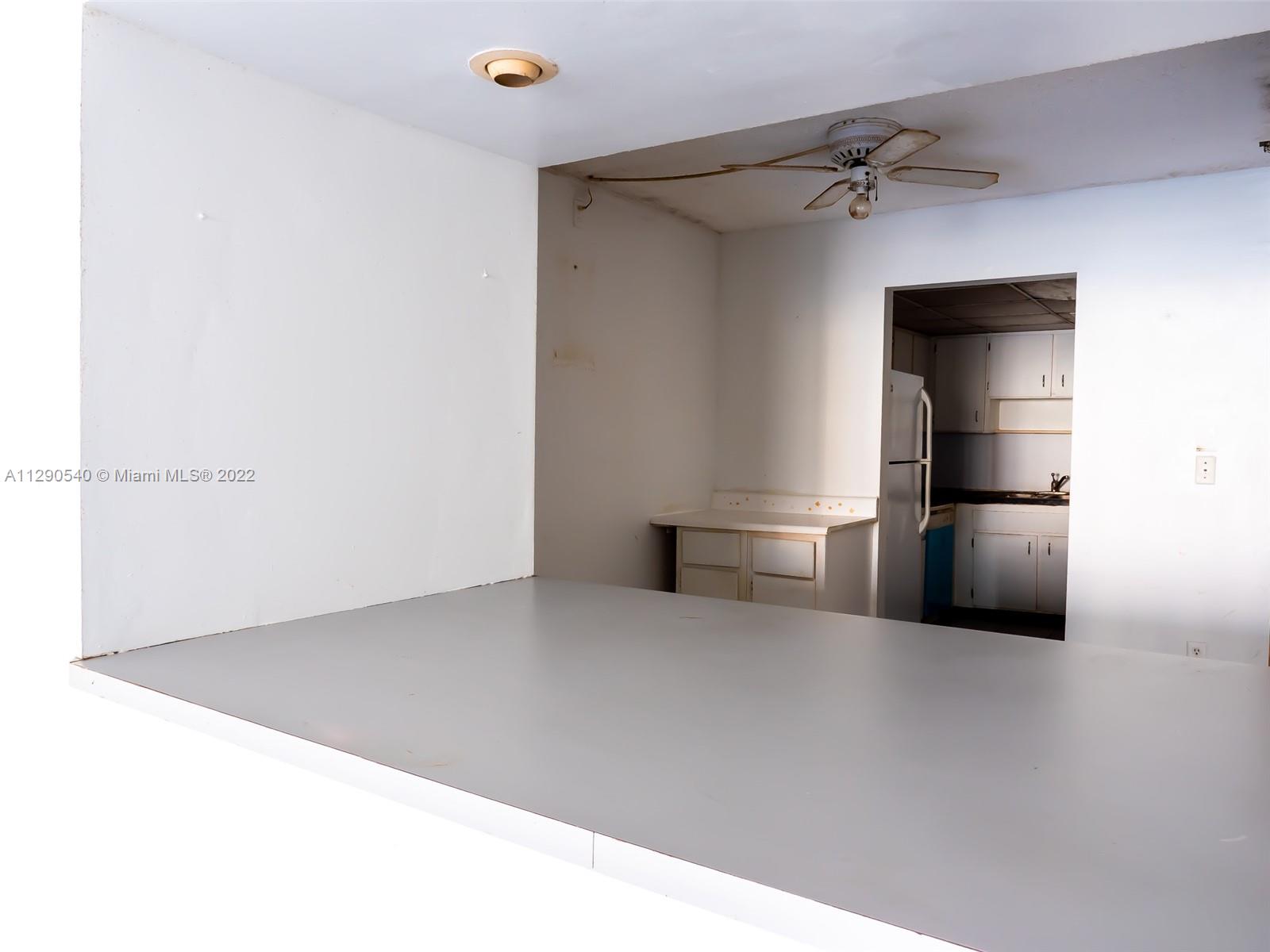 17878 North Bay Road, Unit 306 Sunny Isles Beach, FL 33160 - Photo 11 of 20 a living room with furniture and an empty room