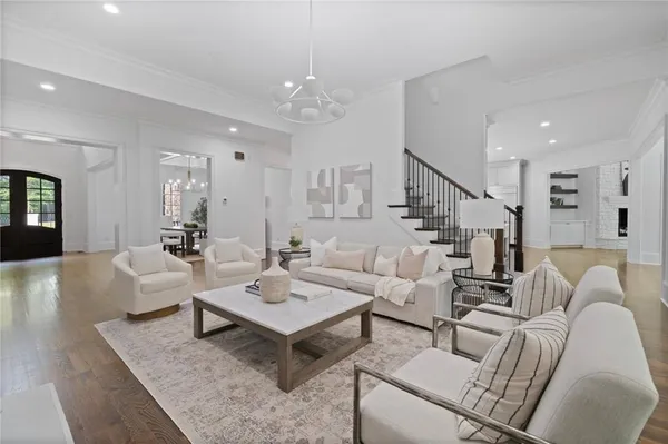 a living room with furniture fireplace and a flat screen tv