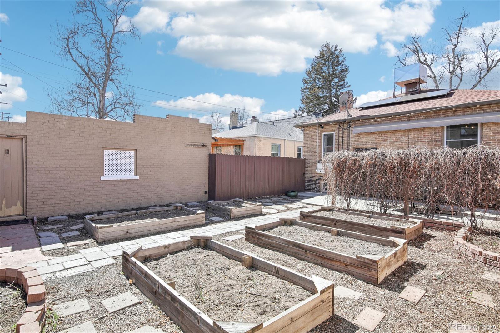 1462 Eudora Street Denver, CO 80220 - Photo 34 of 38 a backyard of a house