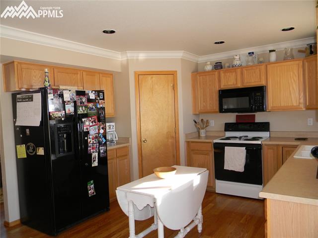 8516 Saddleman Road Peyton, CO 80831 - Photo 9 of 32 Gallery Image 9
