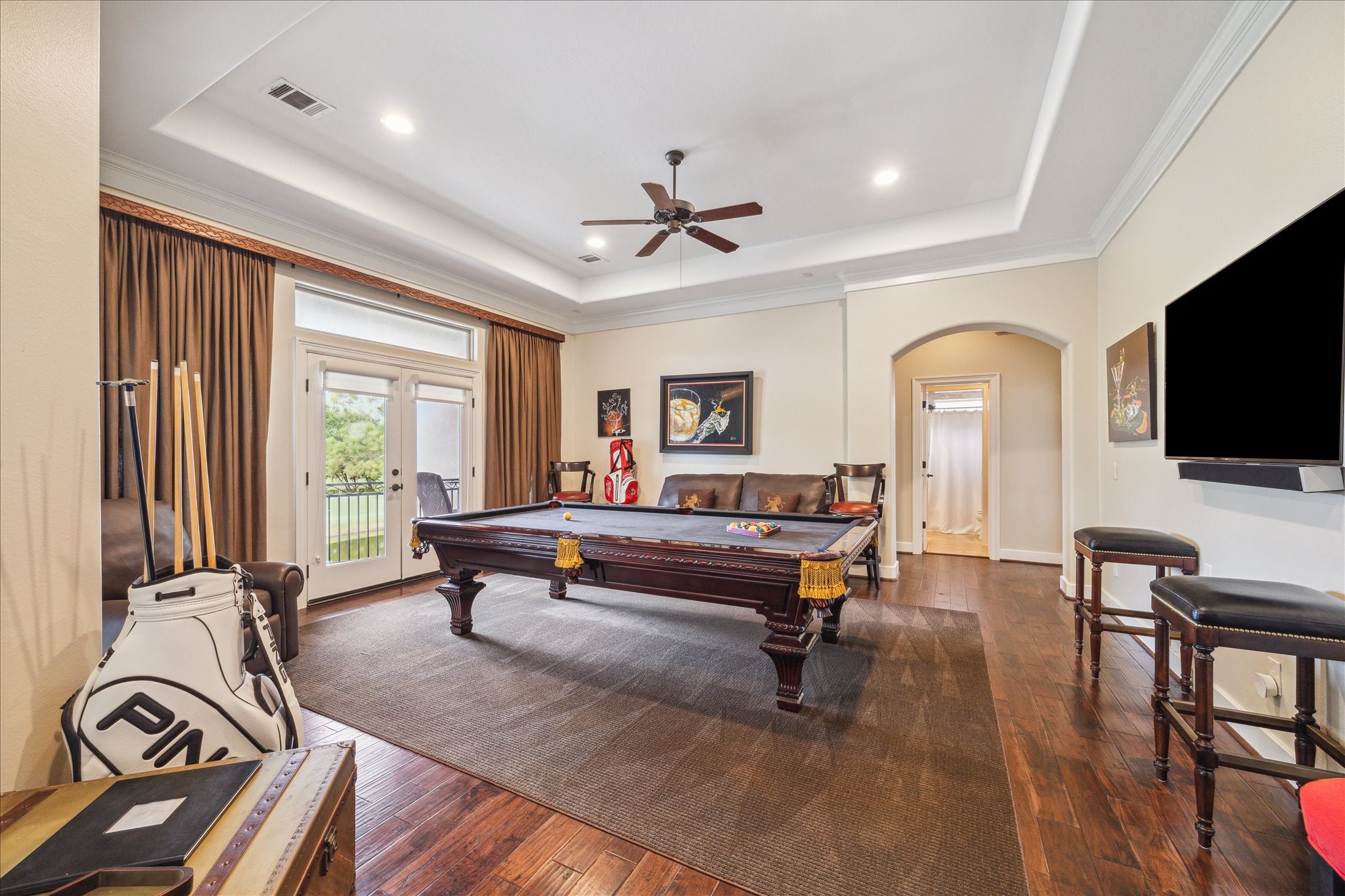3319 Bridgeberry Lane Houston, TX 77082 - Photo 22 of 50 Second floor game room with balcony overlooking the fairway of Hole #4 and lake views