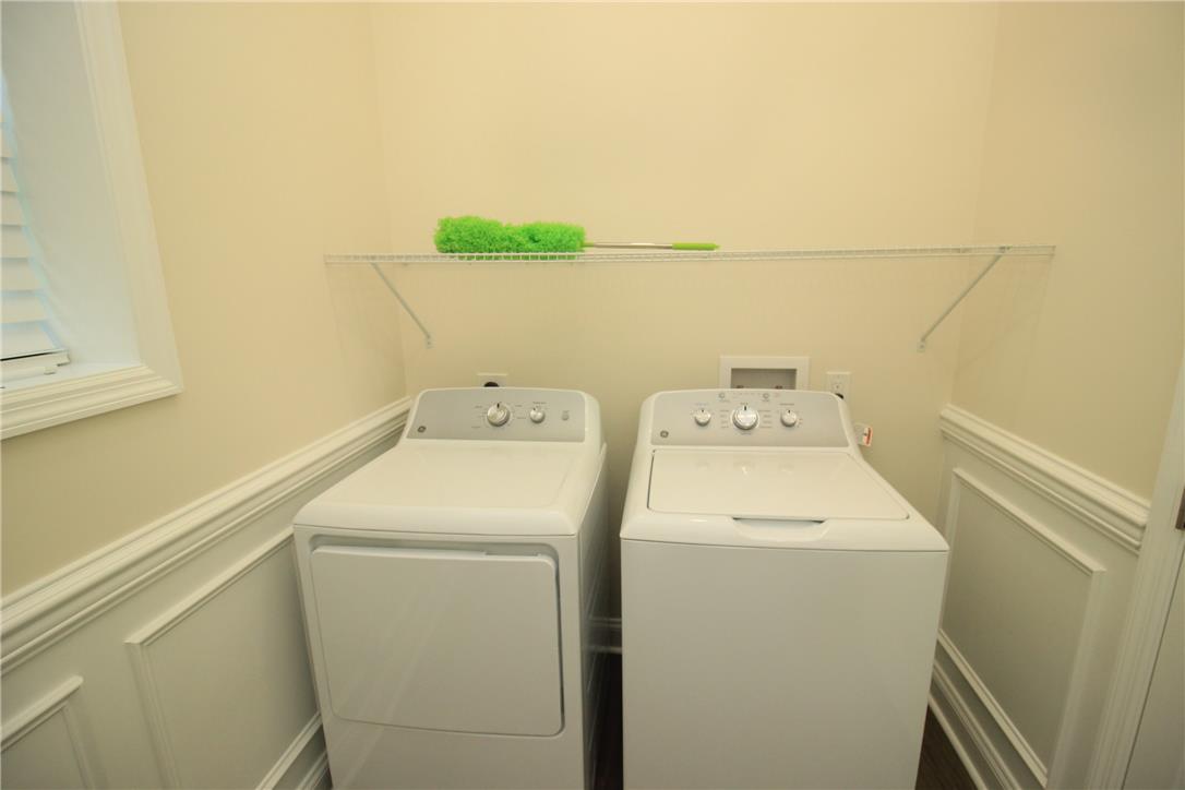3083 Penn Allen Road, Unit B Nazareth, PA 18064 - Photo 19 of 21 A well-appointed laundry area features convenient storage shelving and functional appliances.