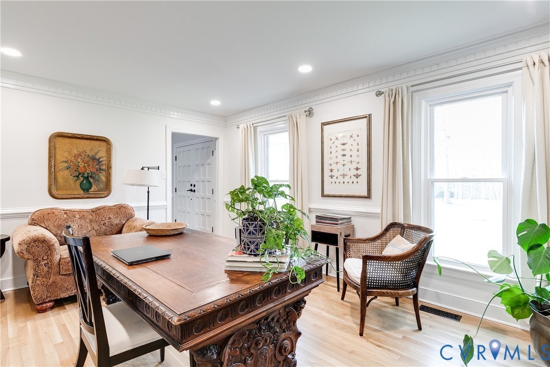 2021 Swamp Fox Road Midlothian, VA 23112 - Photo 14 of 73 a workspace with furniture and a potted plant