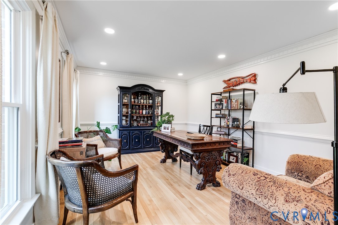 2021 Swamp Fox Road Midlothian, VA 23112 - Photo 15 of 73 a view of a workspace with furniture and a book shelf