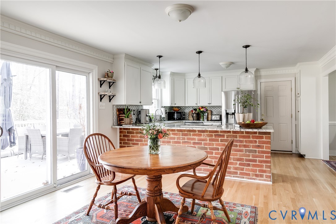 2021 Swamp Fox Road Midlothian, VA 23112 - Photo 24 of 73 a dining room with furniture and window