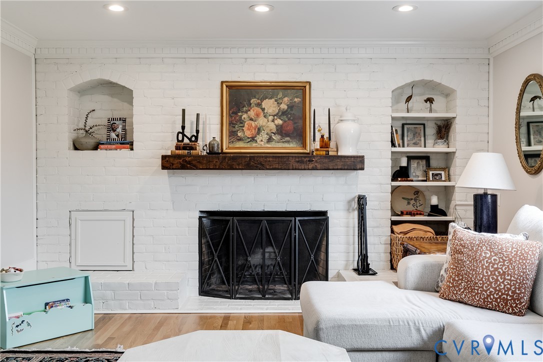 2021 Swamp Fox Road Midlothian, VA 23112 - Photo 30 of 73 a living room with furniture and a fireplace