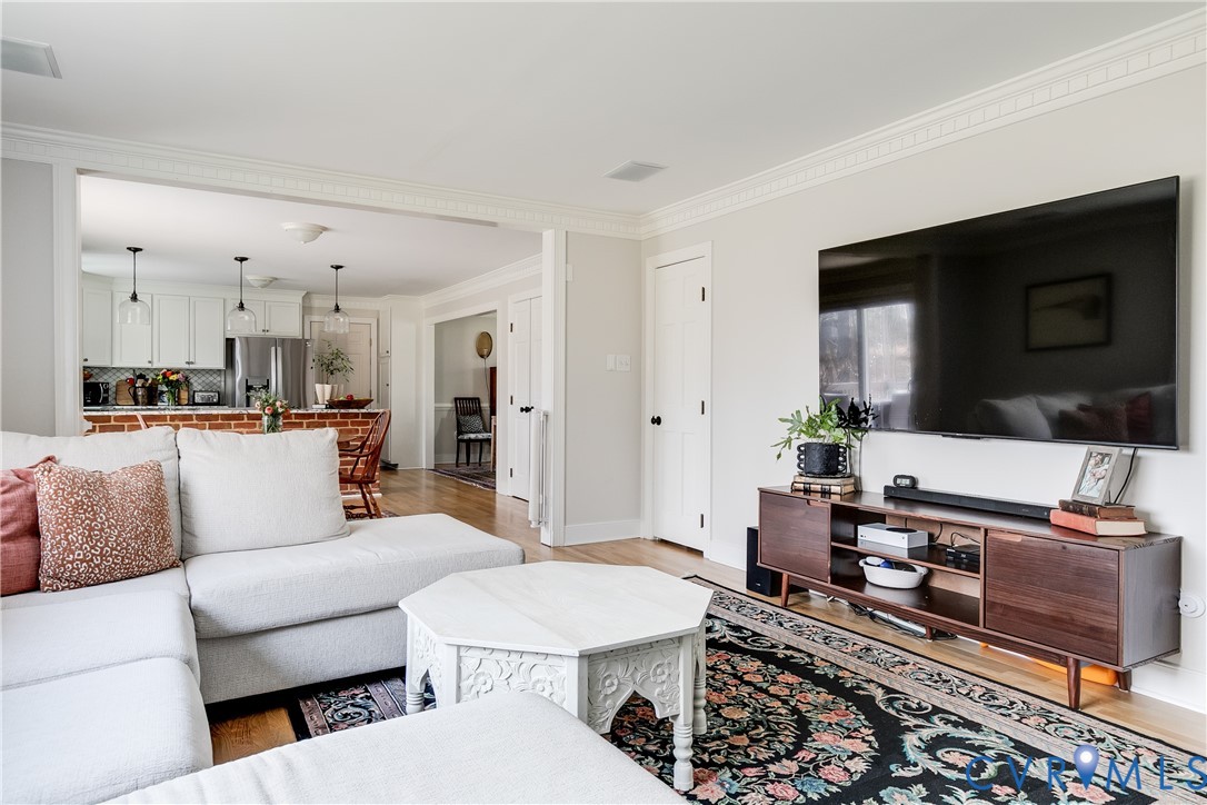 2021 Swamp Fox Road Midlothian, VA 23112 - Photo 32 of 73 a living room with furniture and a flat screen tv