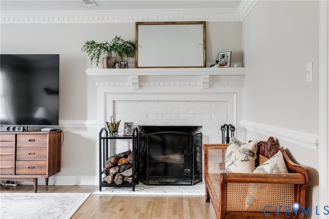 2021 Swamp Fox Road Midlothian, VA 23112 - Photo 35 of 73 a living room with furniture and a fireplace