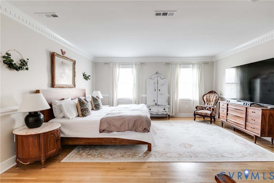 2021 Swamp Fox Road Midlothian, VA 23112 - Photo 39 of 73 a bedroom with furniture and a flat screen tv