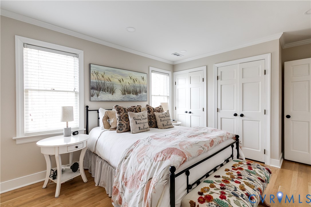 2021 Swamp Fox Road Midlothian, VA 23112 - Photo 48 of 73 a bedroom with a bed and a table in it