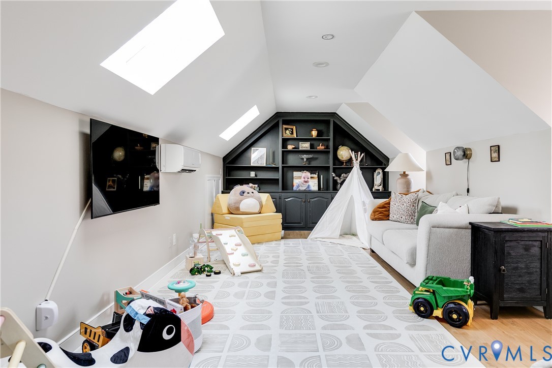 2021 Swamp Fox Road Midlothian, VA 23112 - Photo 53 of 73 a living room with furniture and flat screen tv