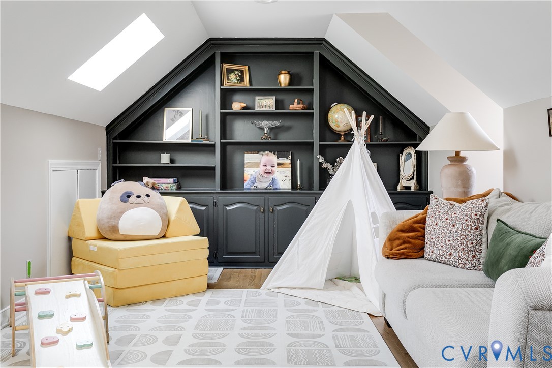 2021 Swamp Fox Road Midlothian, VA 23112 - Photo 54 of 73 a living room with furniture and a window