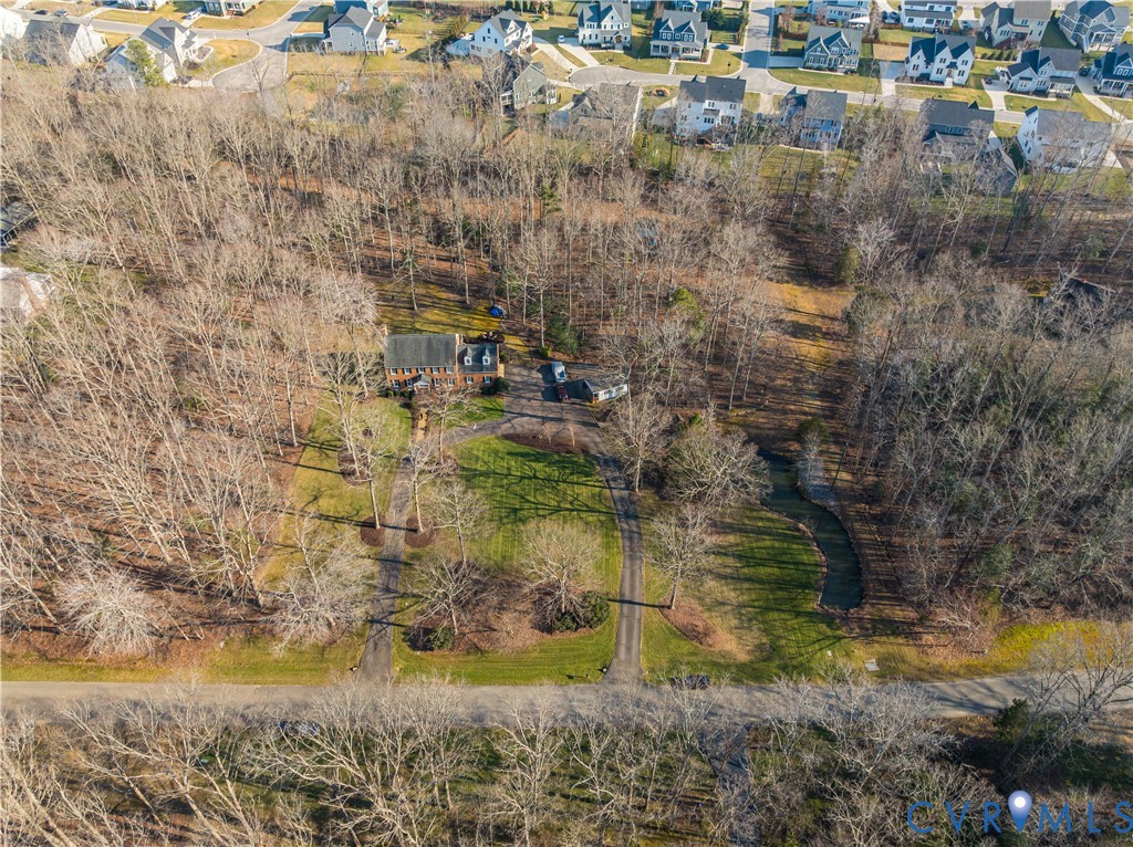2021 Swamp Fox Road Midlothian, VA 23112 - Photo 70 of 73 a aerial view of residential houses with outdoor space