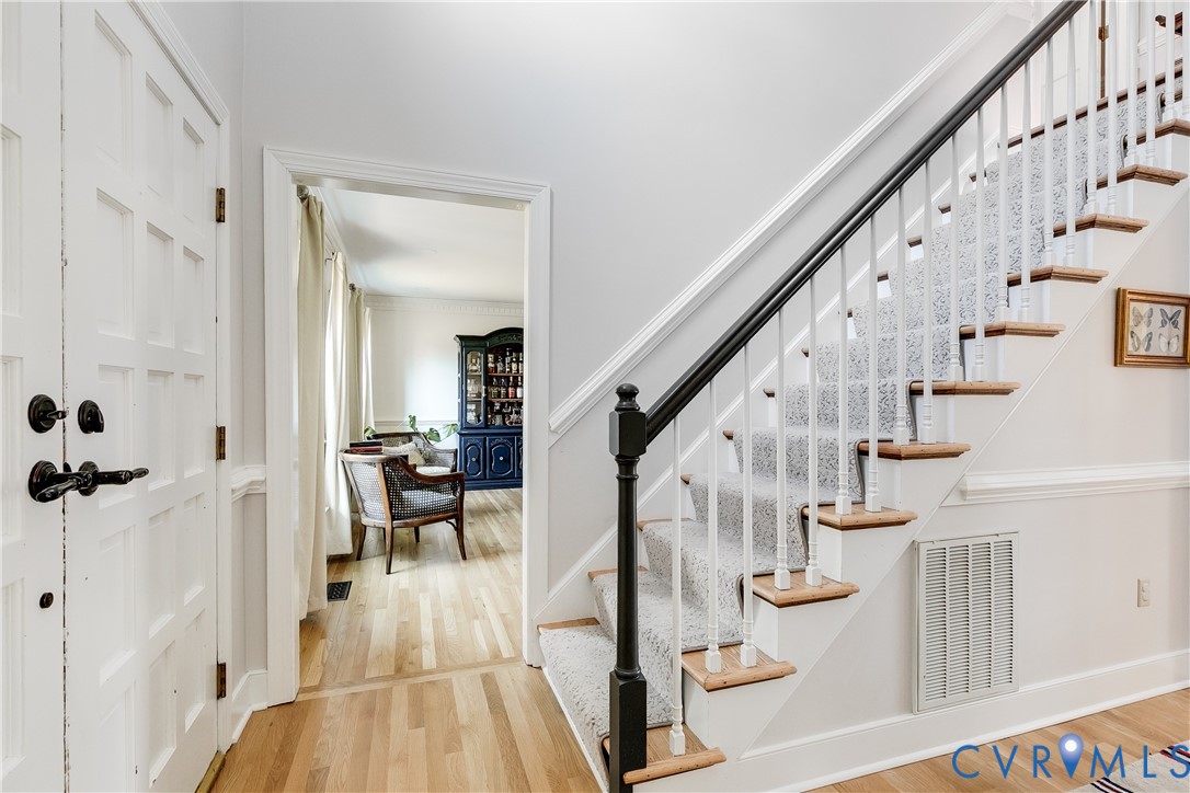 2021 Swamp Fox Road Midlothian, VA 23112 - Photo 9 of 73 a view of entryway and hall with wooden floor
