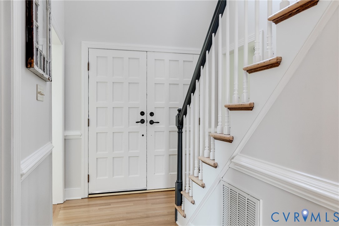 2021 Swamp Fox Road Midlothian, VA 23112 - Photo 10 of 73 a view of staircase with white walls and railing