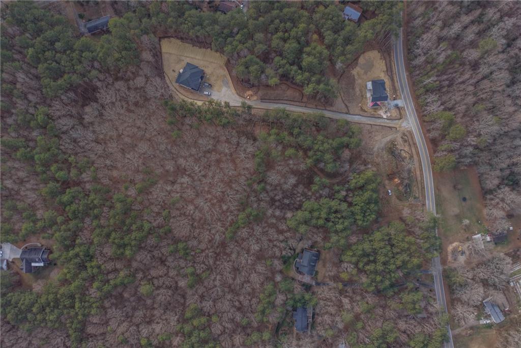 1577 Whitley Road Dacula, GA 30019 - Photo 3 of 5 a view of a dry yard