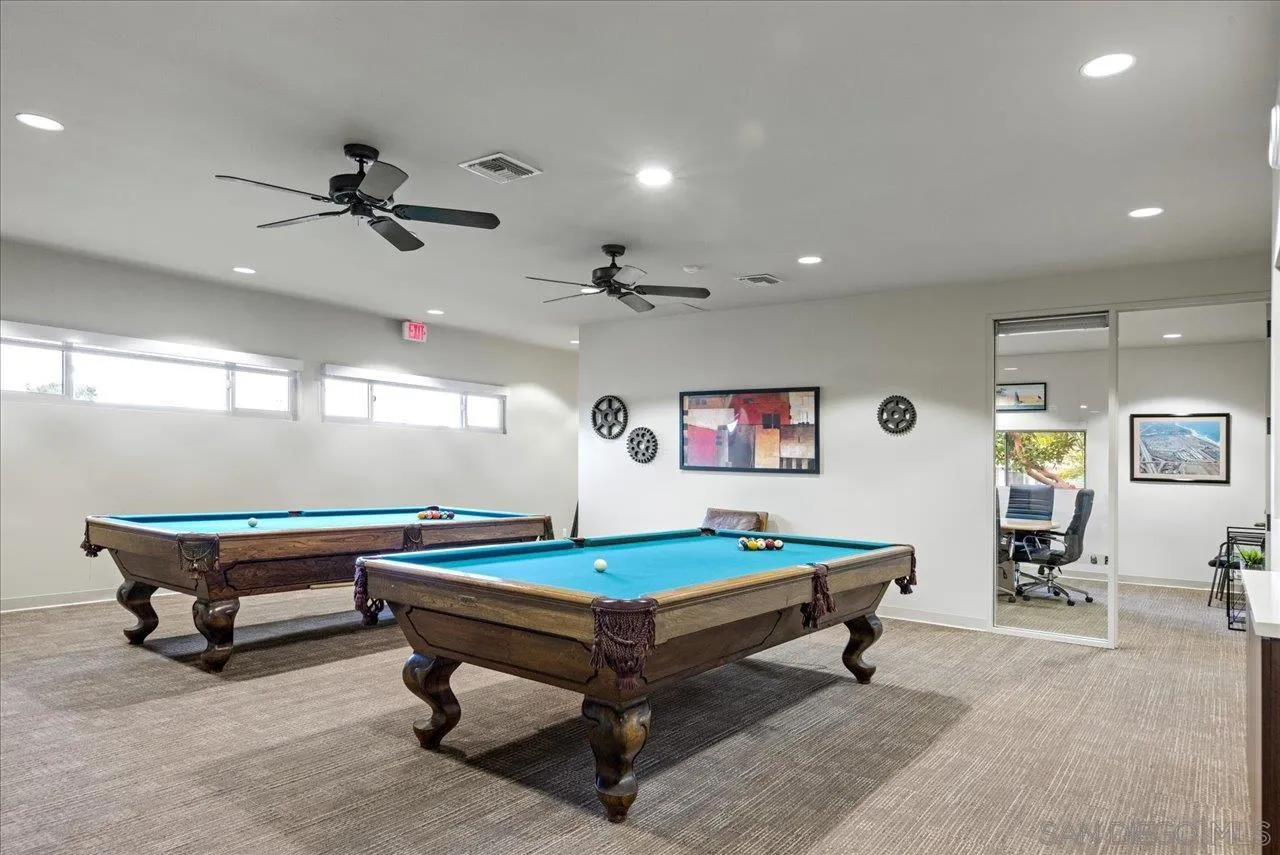 7144 Santa Rosa, Unit 86 Carlsbad, CA 92011 - Photo 16 of 30 a room with pool table and windows