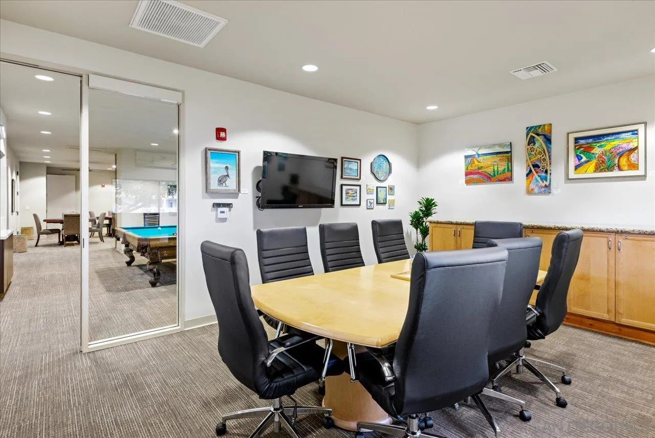 7144 Santa Rosa, Unit 86 Carlsbad, CA 92011 - Photo 17 of 30 a view of a dining room with furniture