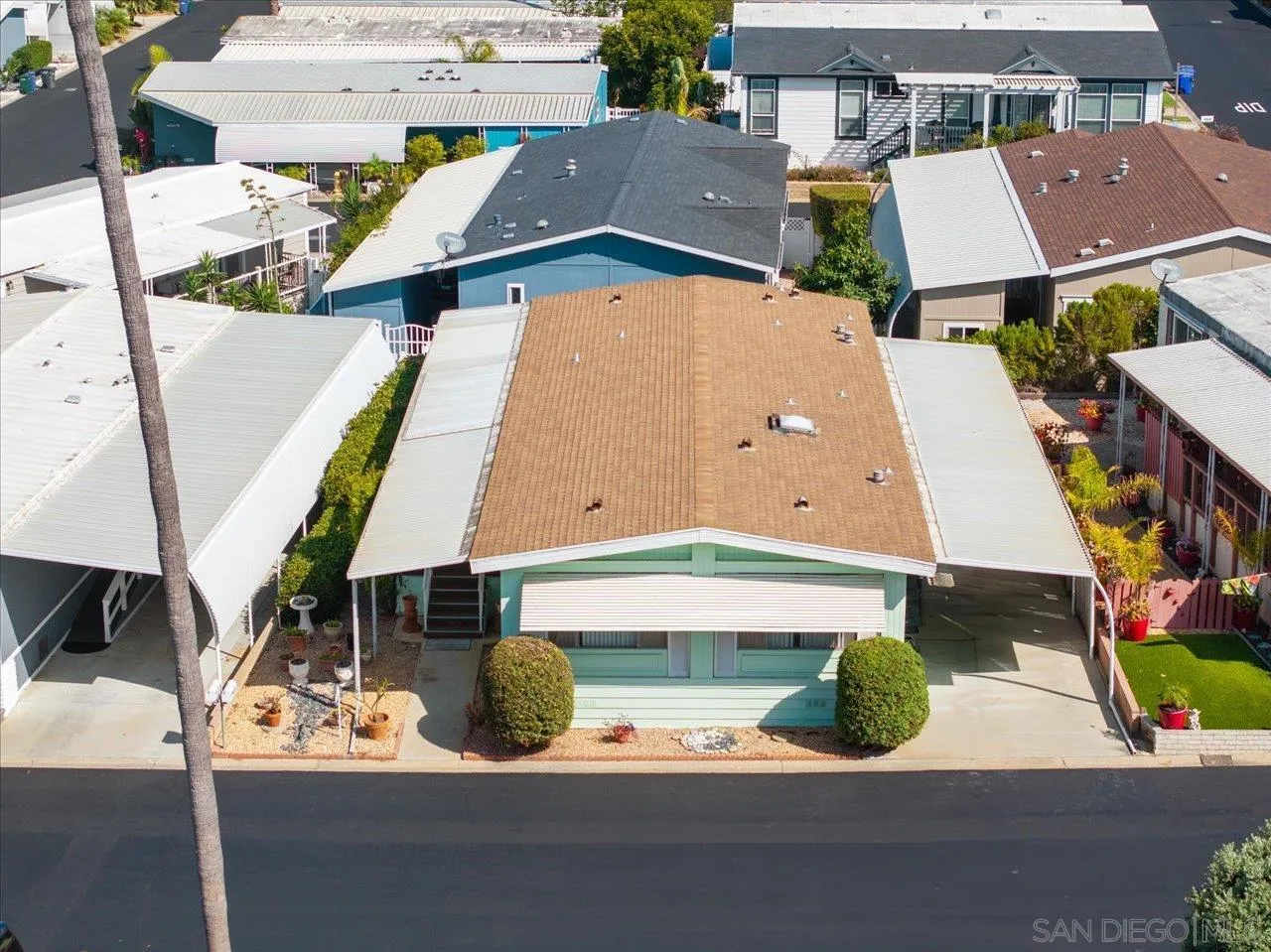 7144 Santa Rosa, Unit 86 Carlsbad, CA 92011 - Photo 4 of 30 an aerial view of residential houses with outdoor space
