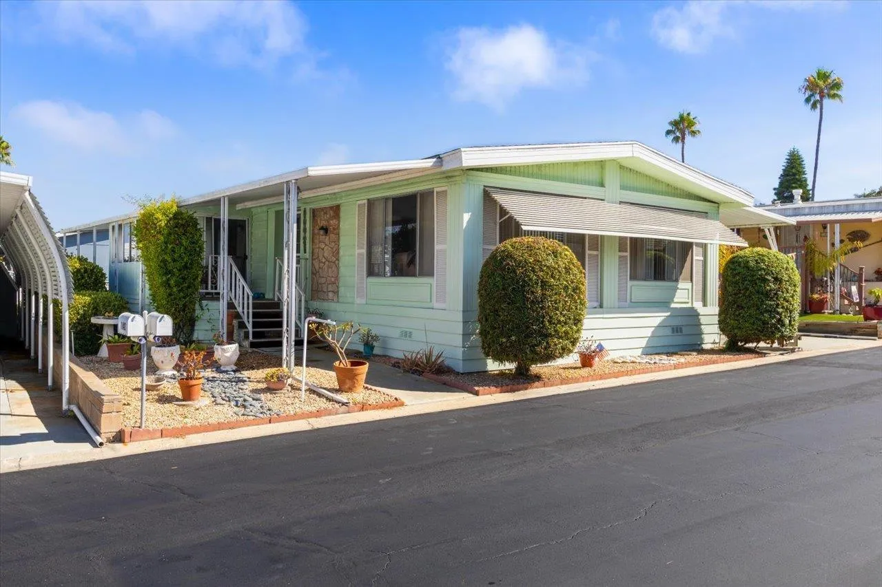 7144 Santa Rosa, Unit 86 Carlsbad, CA 92011 - Photo 6 of 30 a view of a house with outdoor space and porch