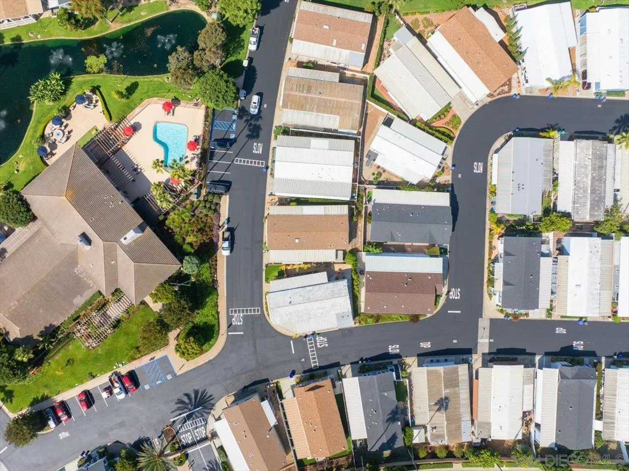 7144 Santa Rosa, Unit 86 Carlsbad, CA 92011 - Photo 8 of 30 an aerial view of a house with a yard and outdoor seating