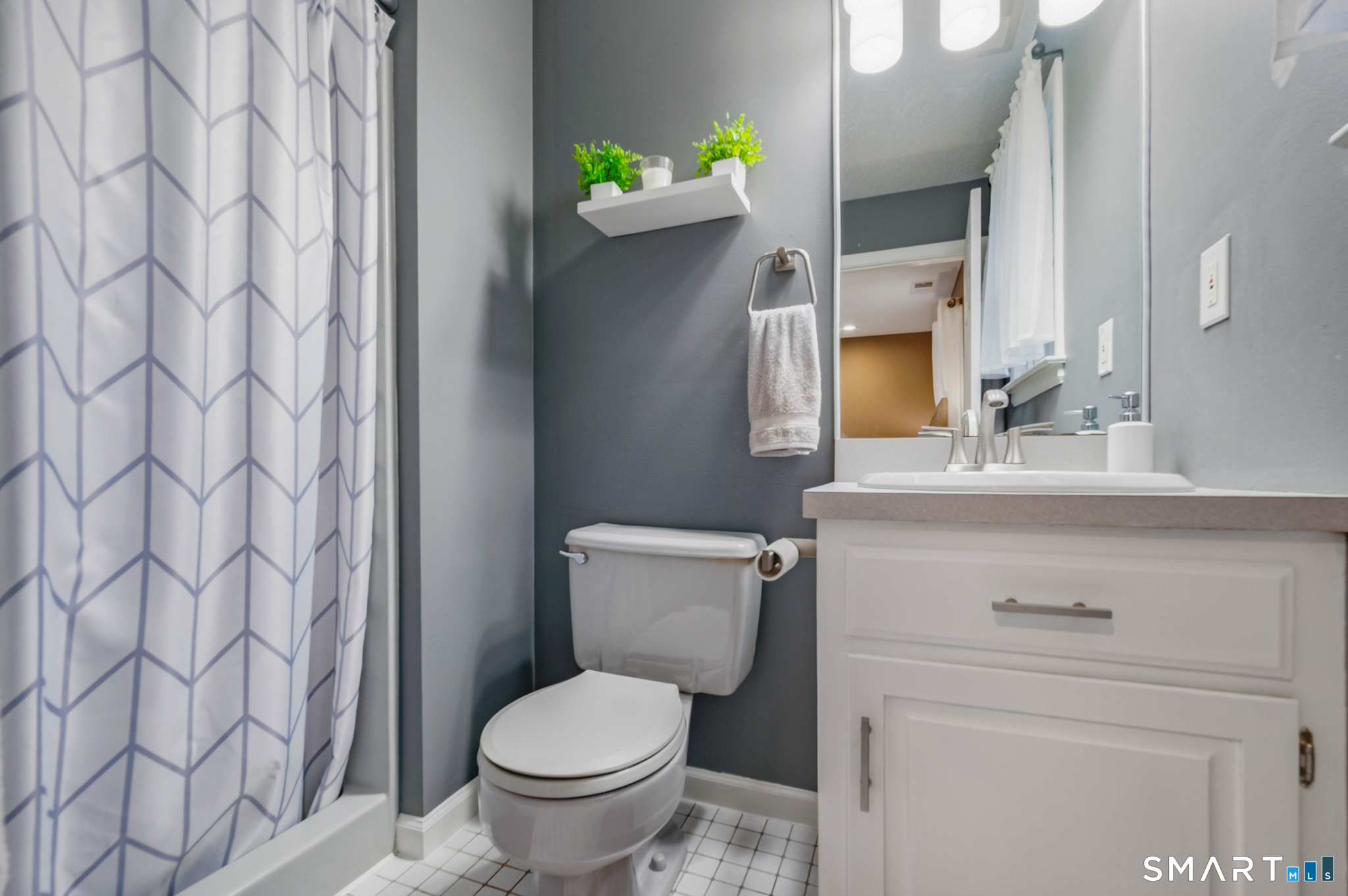 536 Redstone Hill Road, Unit 24 Bristol, CT 06010 - Photo 12 of 27 a bathroom with a sink and toilet