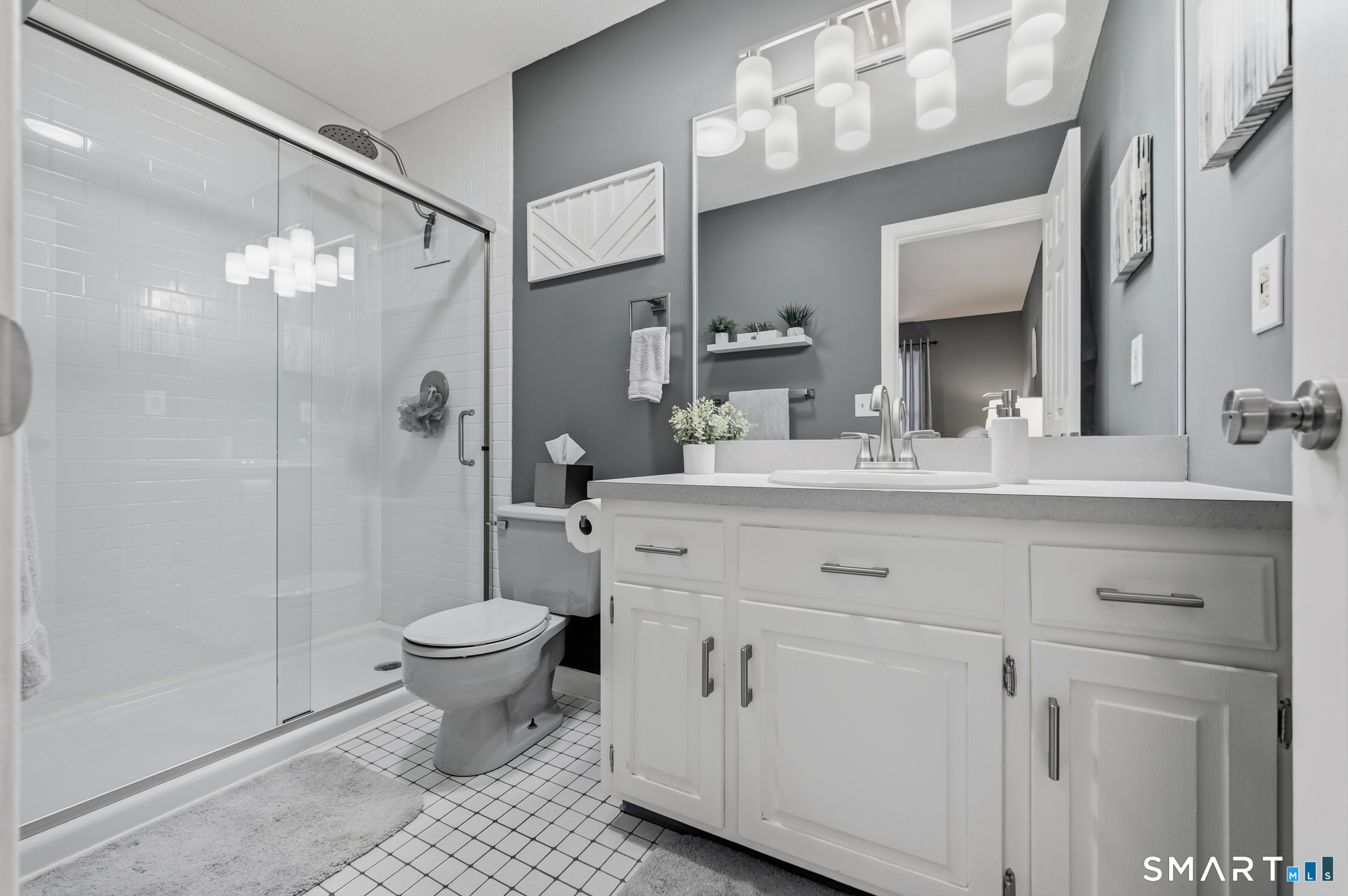 536 Redstone Hill Road, Unit 24 Bristol, CT 06010 - Photo 14 of 27 a bathroom with a sink toilet and shower