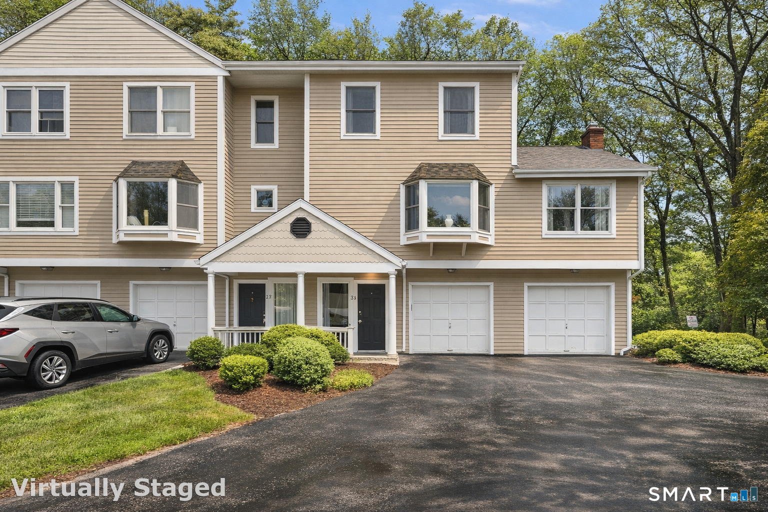 536 Redstone Hill Road, Unit 24 Bristol, CT 06010 - Photo 18 of 27 a house view with a garden space