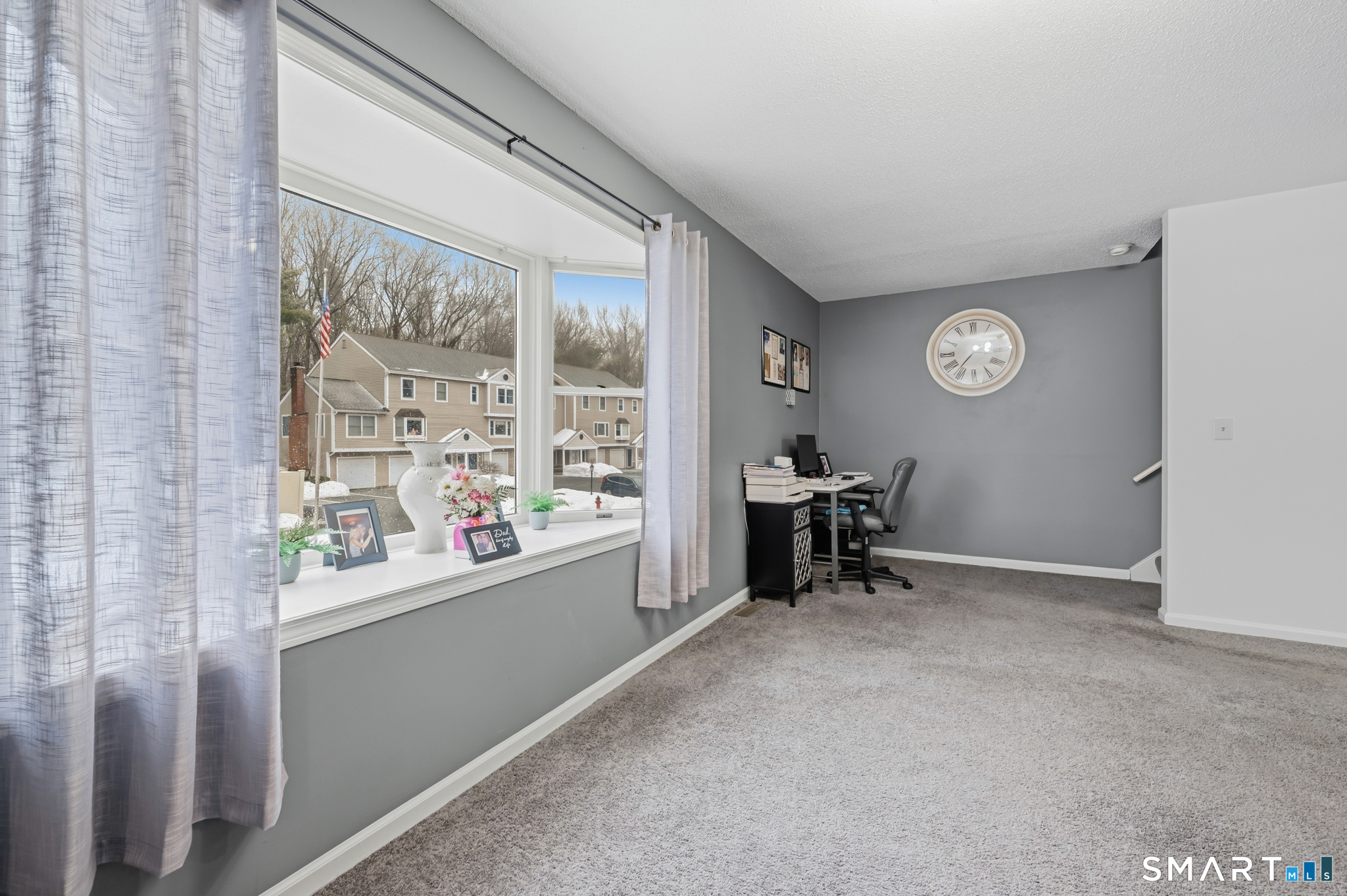 536 Redstone Hill Road, Unit 24 Bristol, CT 06010 - Photo 6 of 27 a view of an empty room with a window