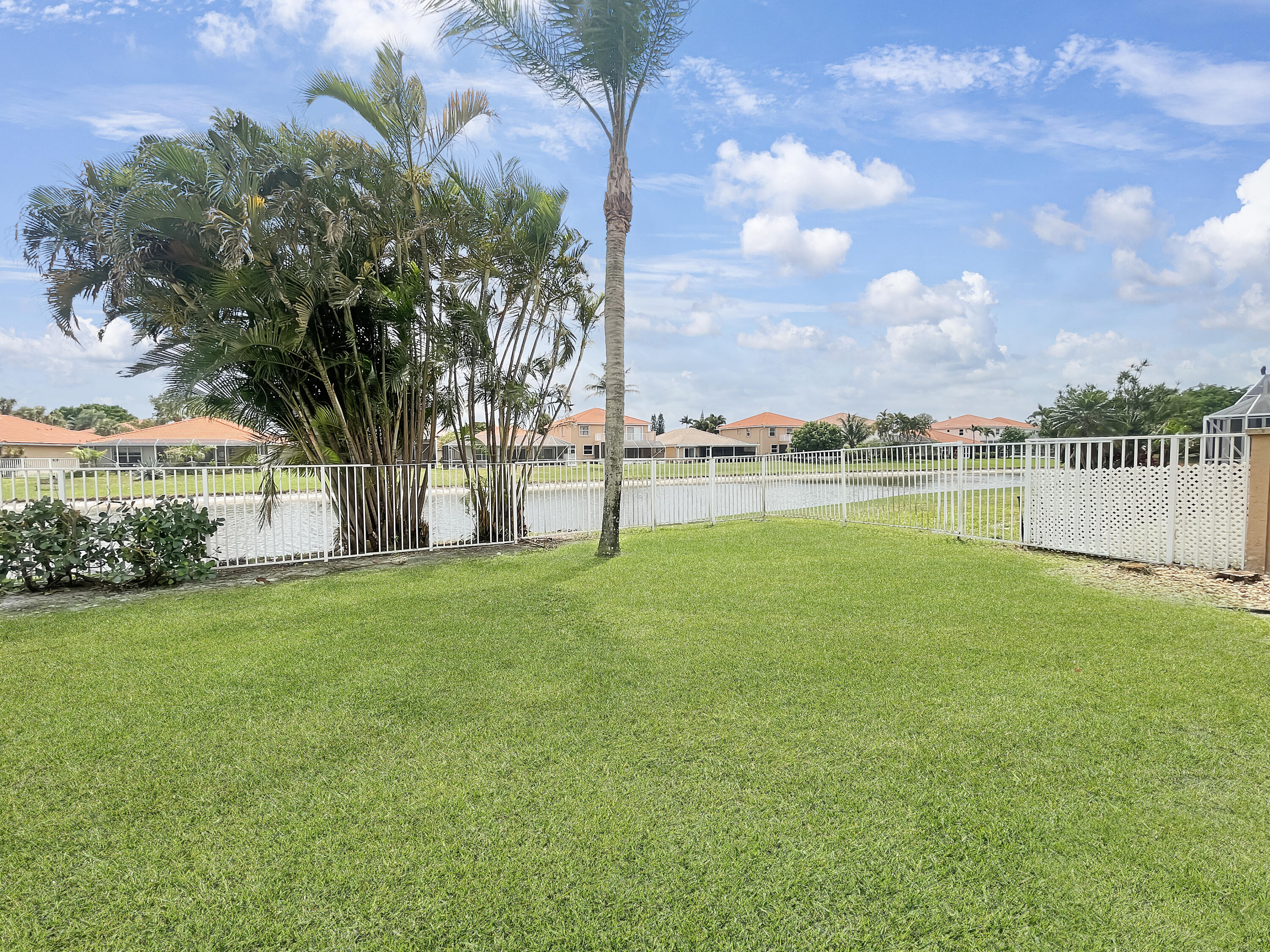 11292 Coral Key Drive Boca Raton, FL 33498 - Photo 40 of 50 Vast Backyard w/Lake Views/Fenced In