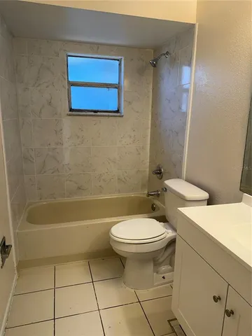 a view of a swimming pool with an ocean view