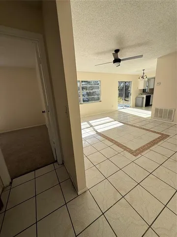 a kitchen with a sink a stove and refrigerator