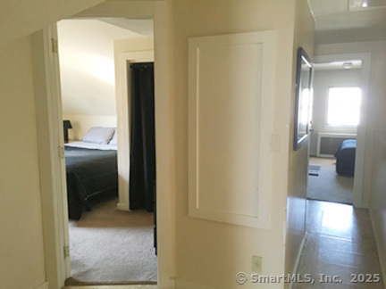 223 Broad Street Meriden, CT 06450 - Photo 15 of 17 a en suite bathroom with a sink and a mirror