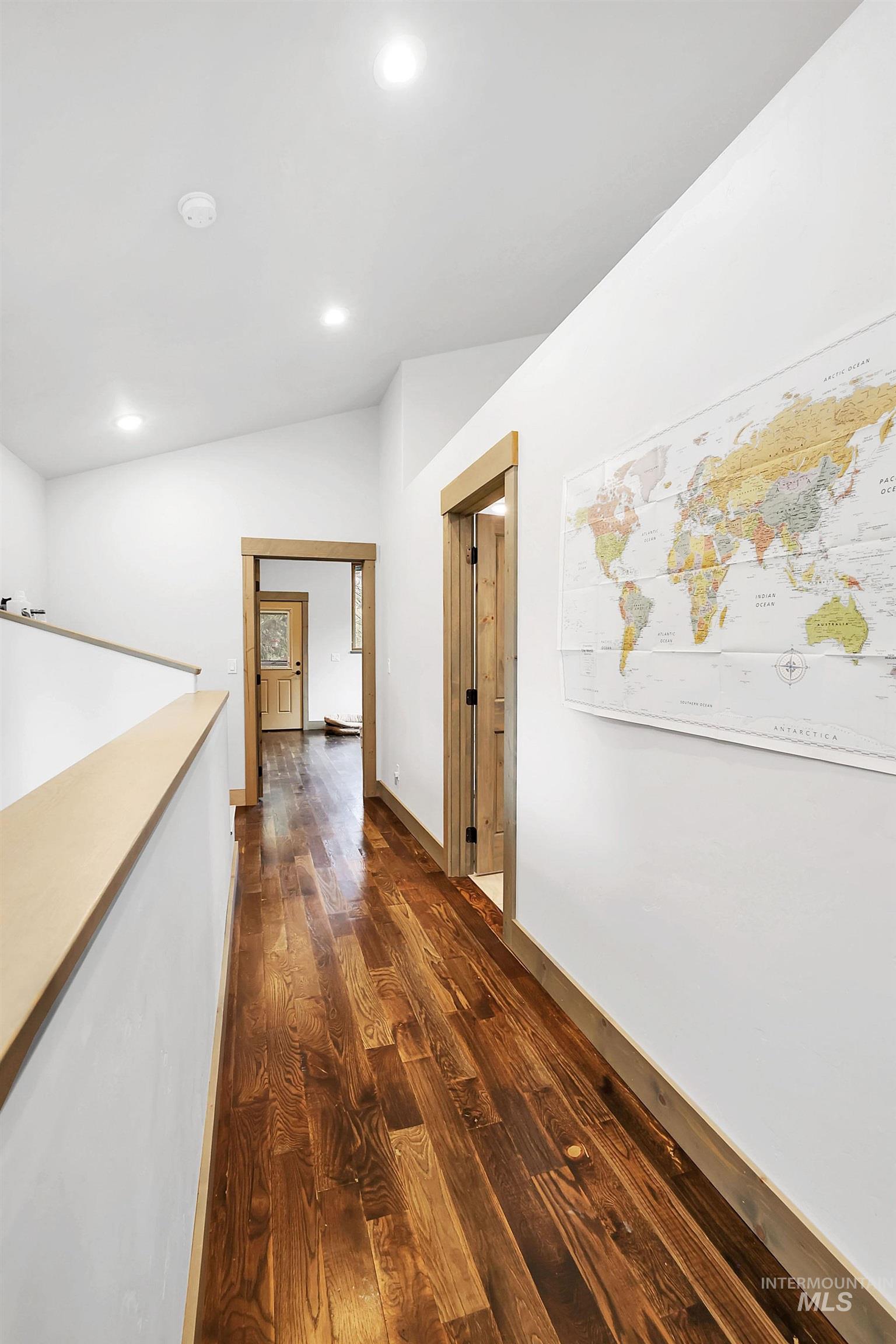 715 Spruce Street McCall, ID 83638 - Photo 21 of 37 Hallway featuring dark wood-type flooring, vaulted ceiling, and recessed lighting