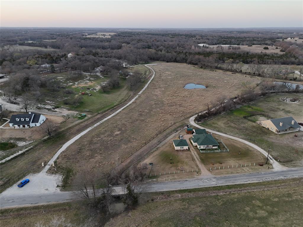 3891 Bethel-Cannon Road Van Alstyne, TX 75495 - Photo 4 of 16 an aerial view of a house with a yard