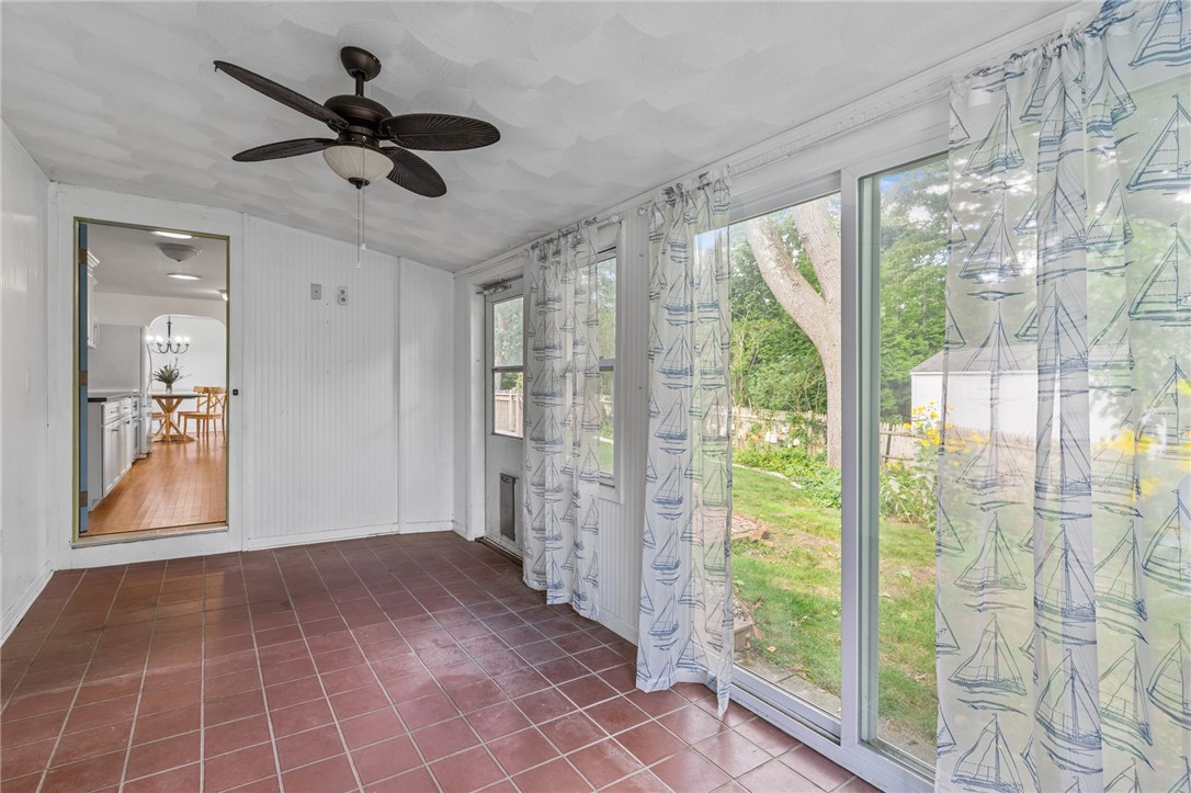 139 Rangeley Road Cranston, RI 02920 - Photo 8 of 16 Sunroom with sliding glass doors