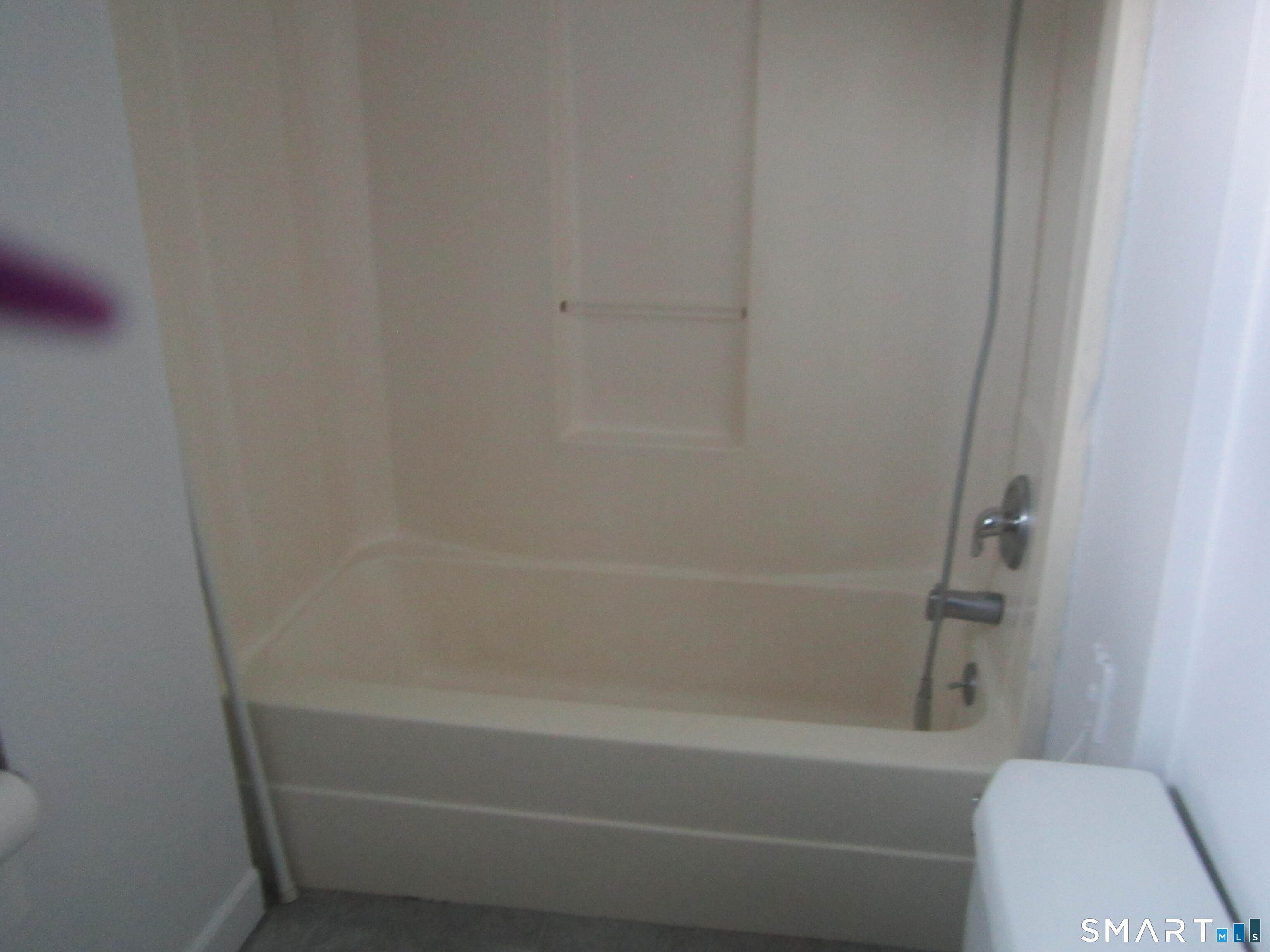 78 Alcove Street Meriden, CT 06451 - Photo 4 of 10 a bathroom with a bathtub