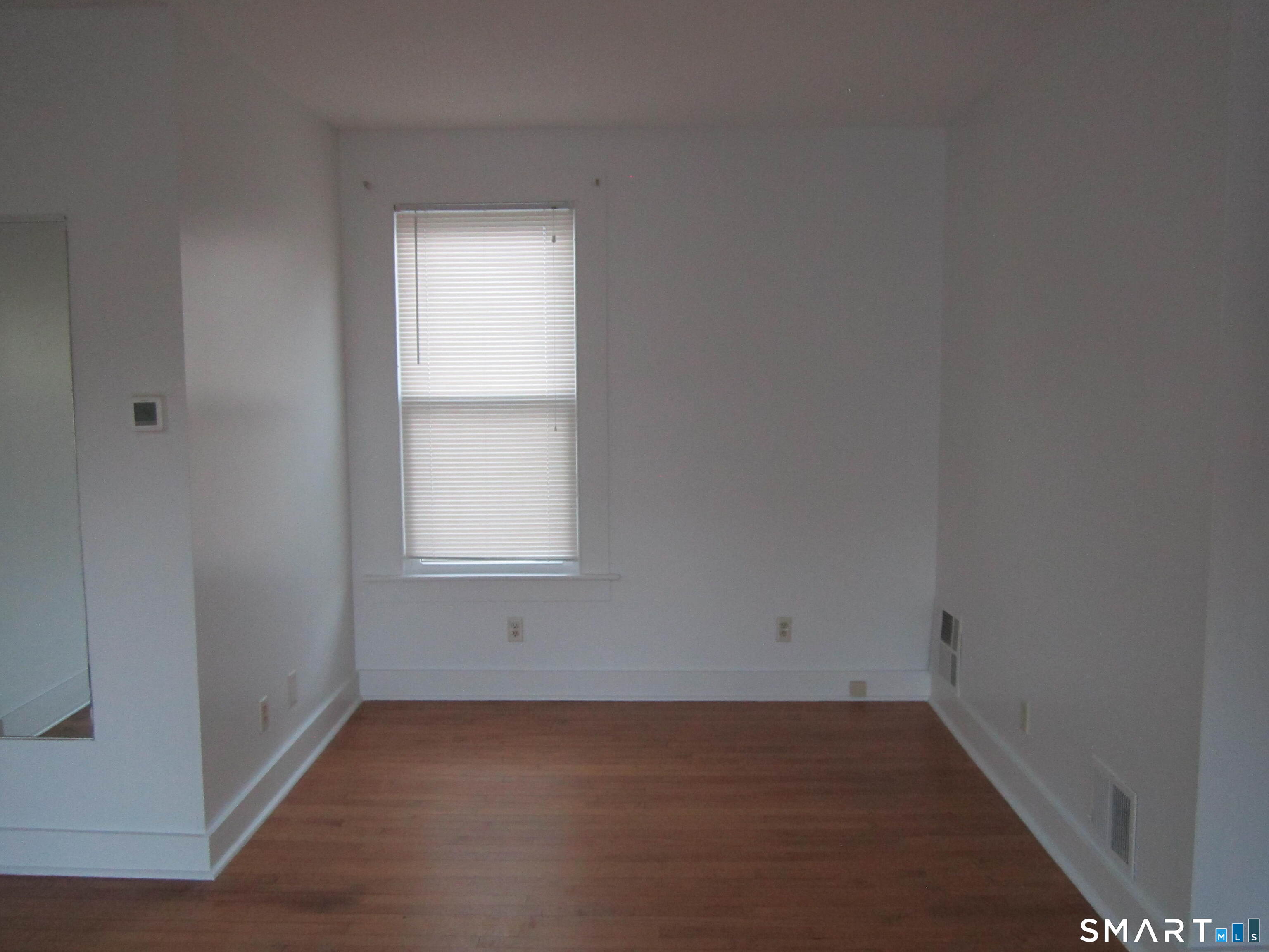 78 Alcove Street Meriden, CT 06451 - Photo 9 of 10 a view of an empty room with a window