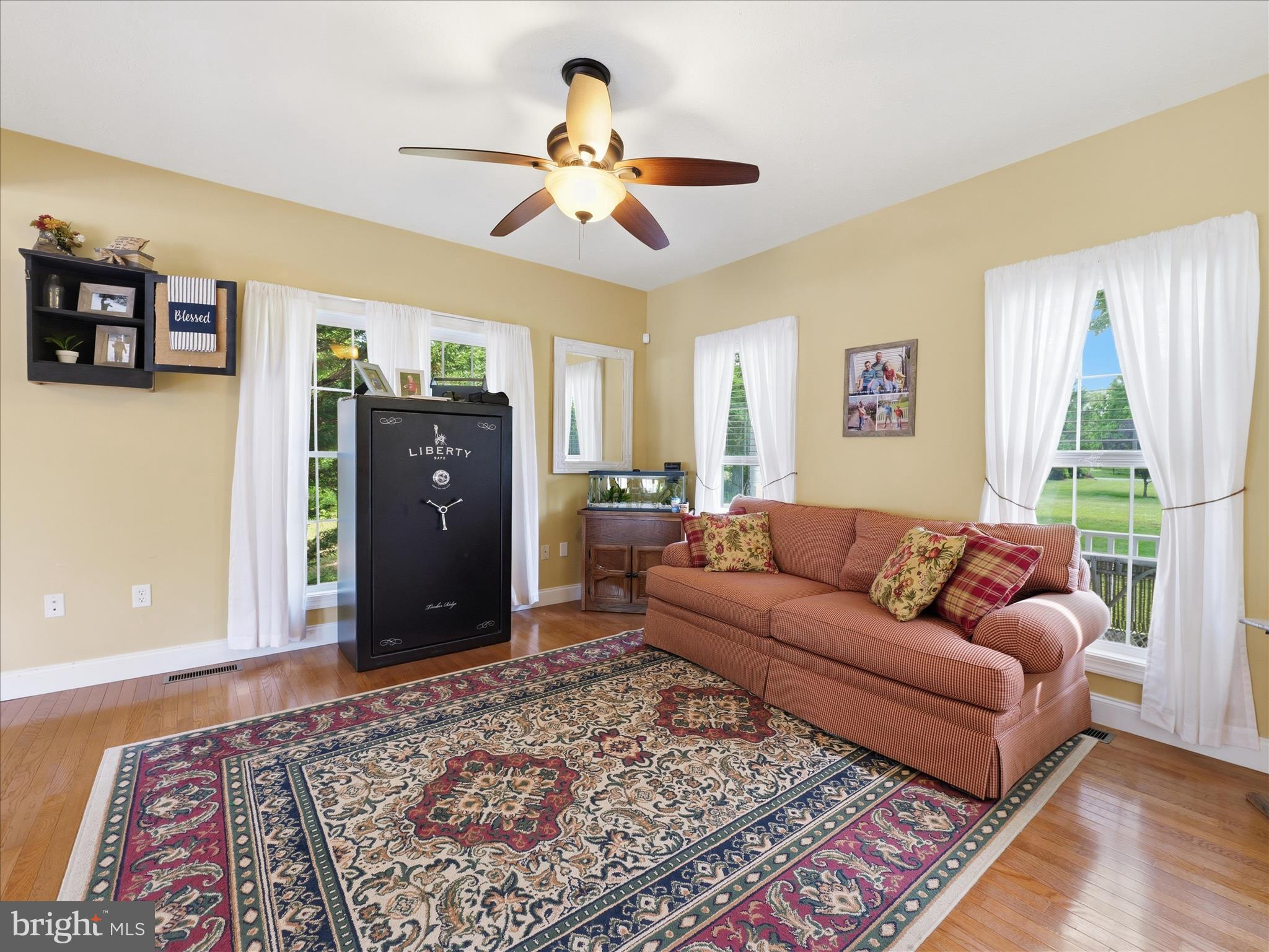 726 Doe Run Road Inwood, WV 25428 - Photo 33 of 68 a living room with furniture and a rug