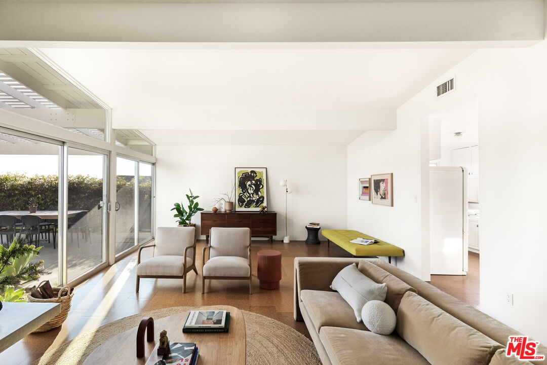 3702 Oceanhill Way Malibu, CA 90265 - Photo 3 of 8 a living room with furniture and a large window