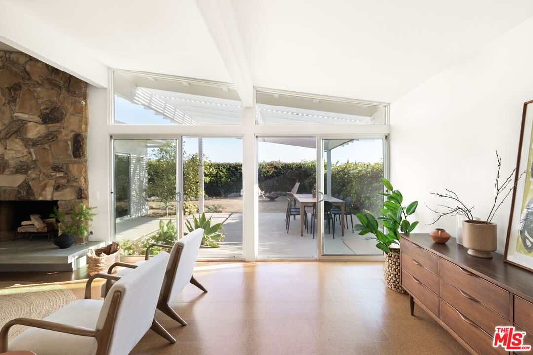 3702 Oceanhill Way Malibu, CA 90265 - Photo 5 of 8 a view of a dining room with furniture window and outside view