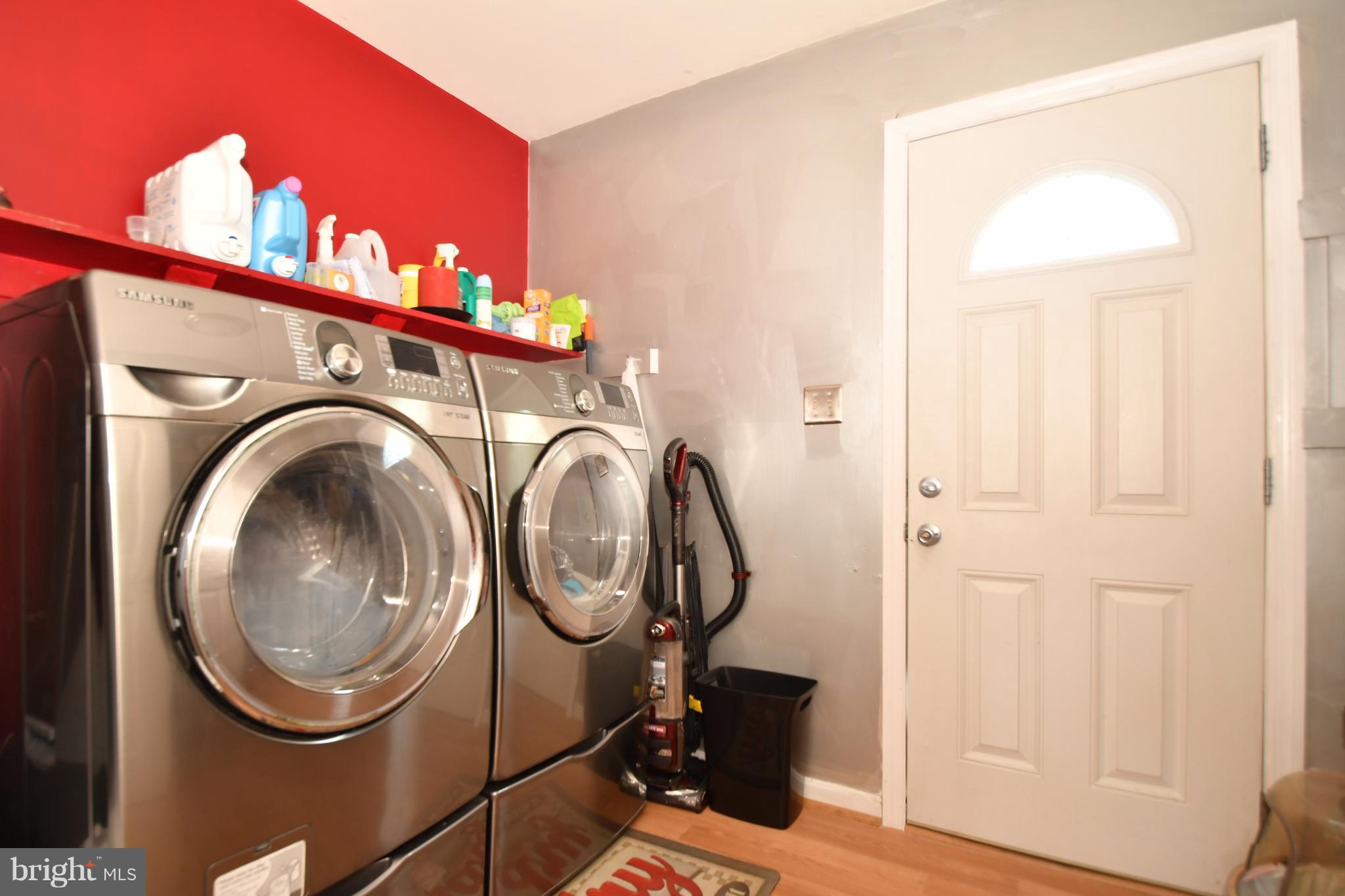 8126 Old Philadelphia Road Baltimore, MD 21237 - Photo 30 of 30 a utility room with dryer and washer