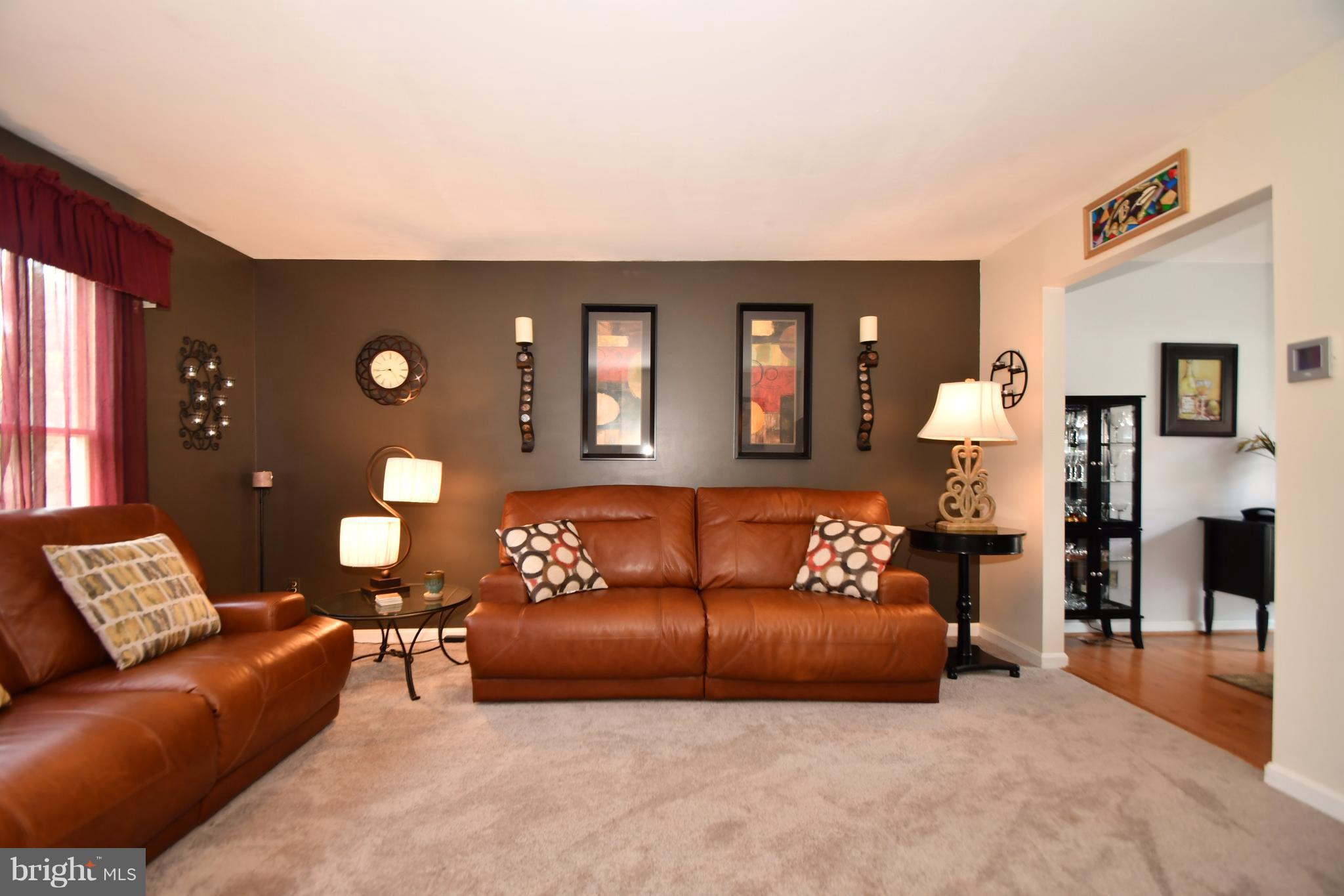 8126 Old Philadelphia Road Baltimore, MD 21237 - Photo 5 of 30 a living room with furniture and a couch