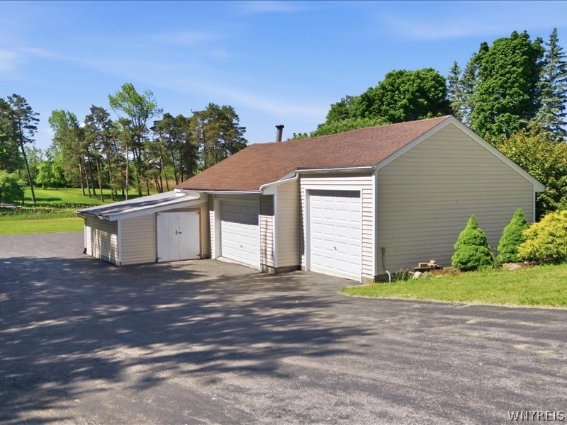 699 Losson Road Cheektowaga, NY 14227 - Photo 3 of 50 3 + Car garage includes wb stove for heat , New 3
