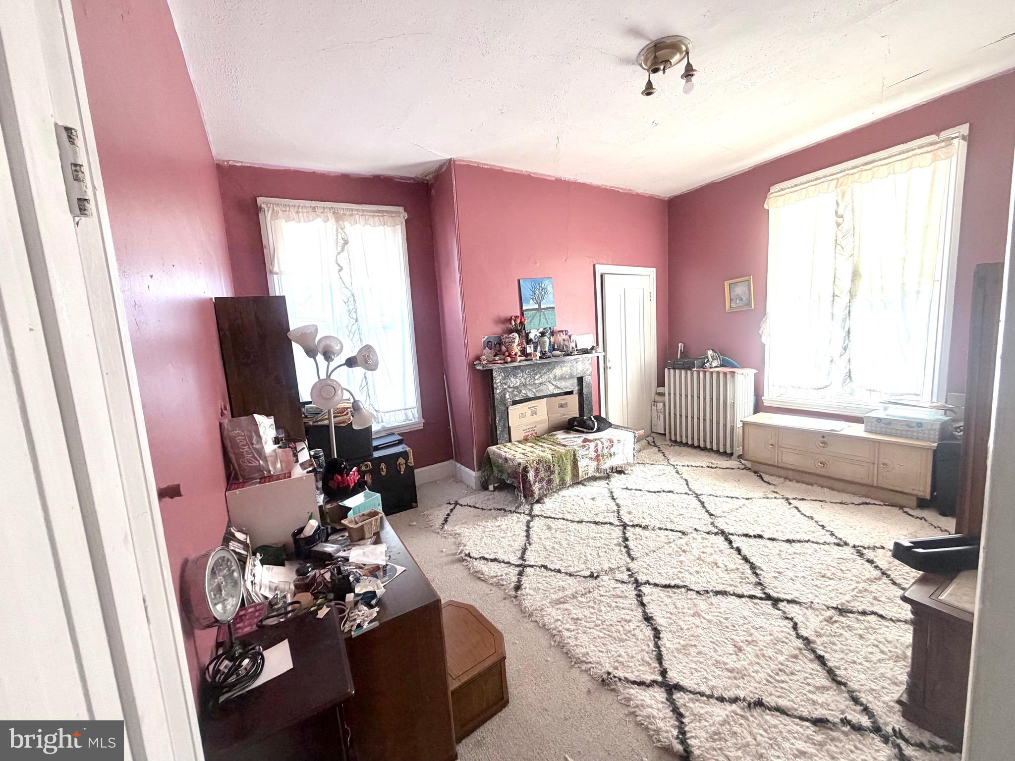 95 Mill Street Mount Holly, NJ 08060 - Photo 11 of 15 a living room with furniture and a large window