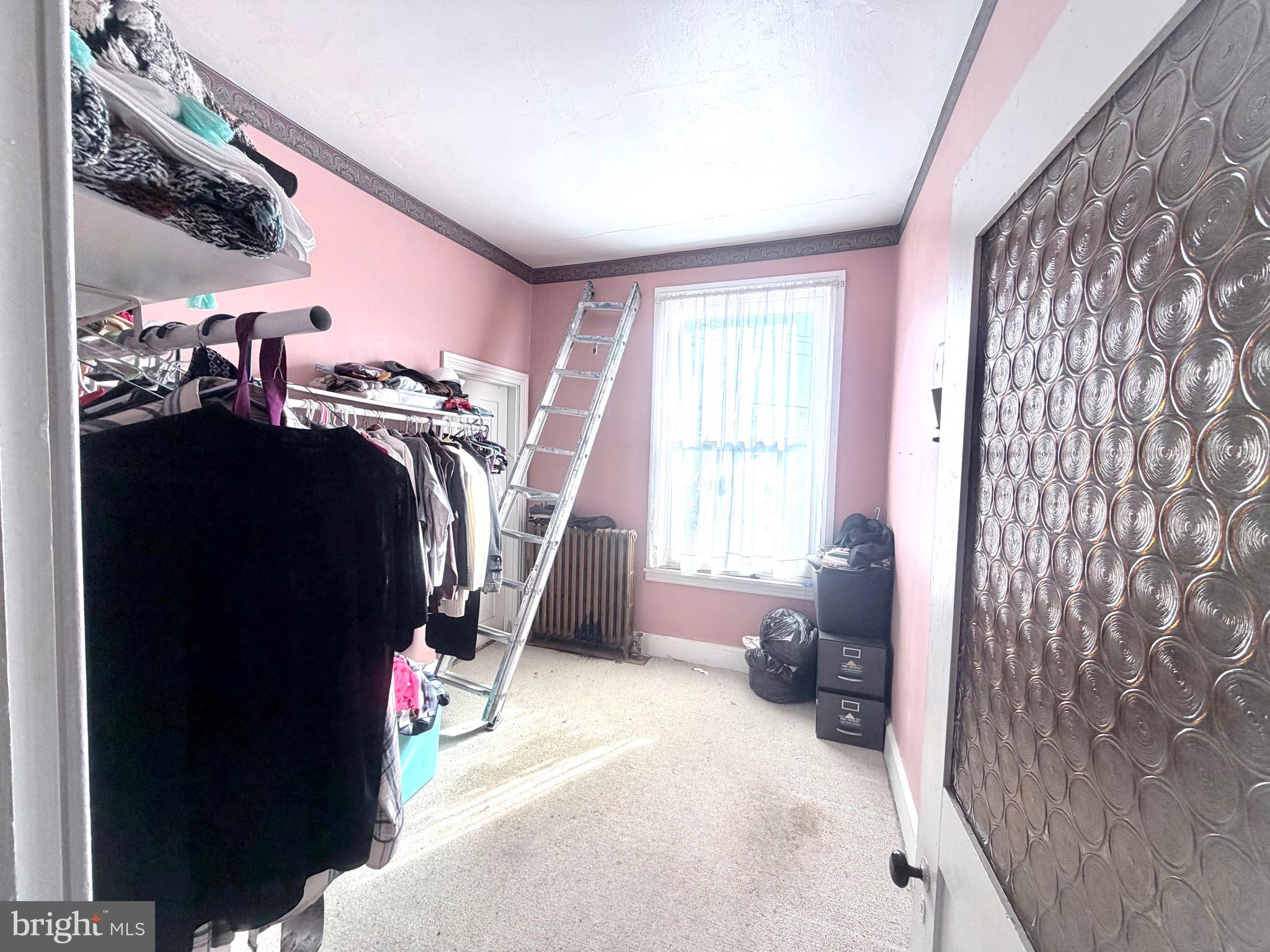 95 Mill Street Mount Holly, NJ 08060 - Photo 12 of 15 a view of a livingroom with furniture and a window