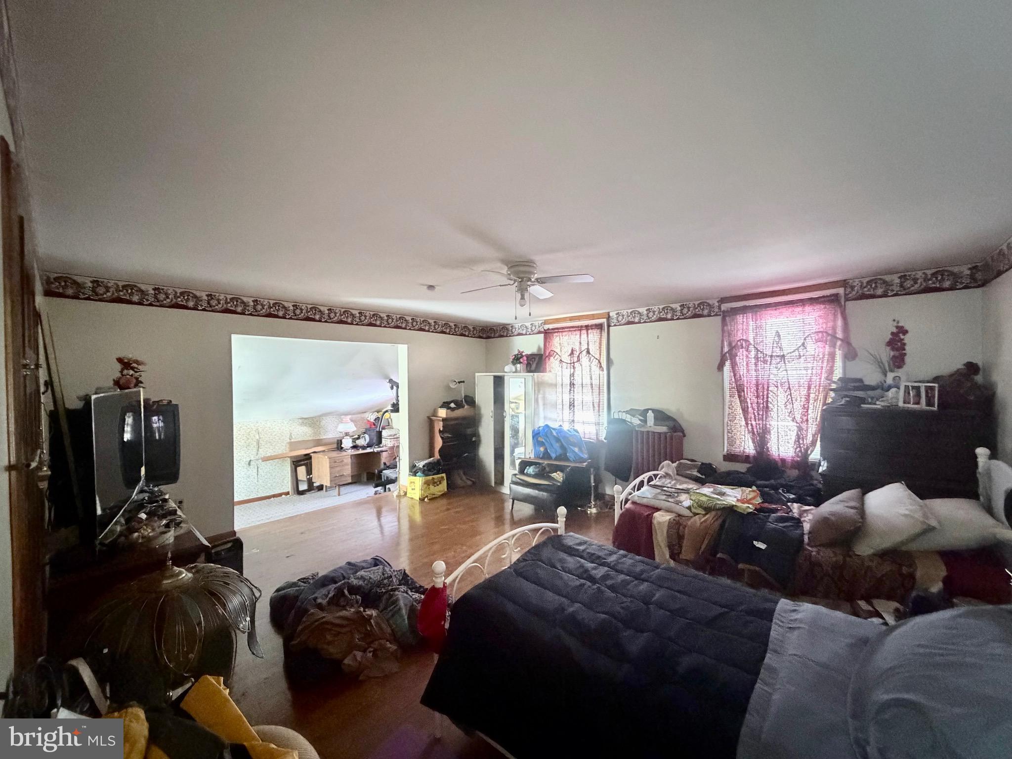 95 Mill Street Mount Holly, NJ 08060 - Photo 13 of 15 a living room with furniture and a large window