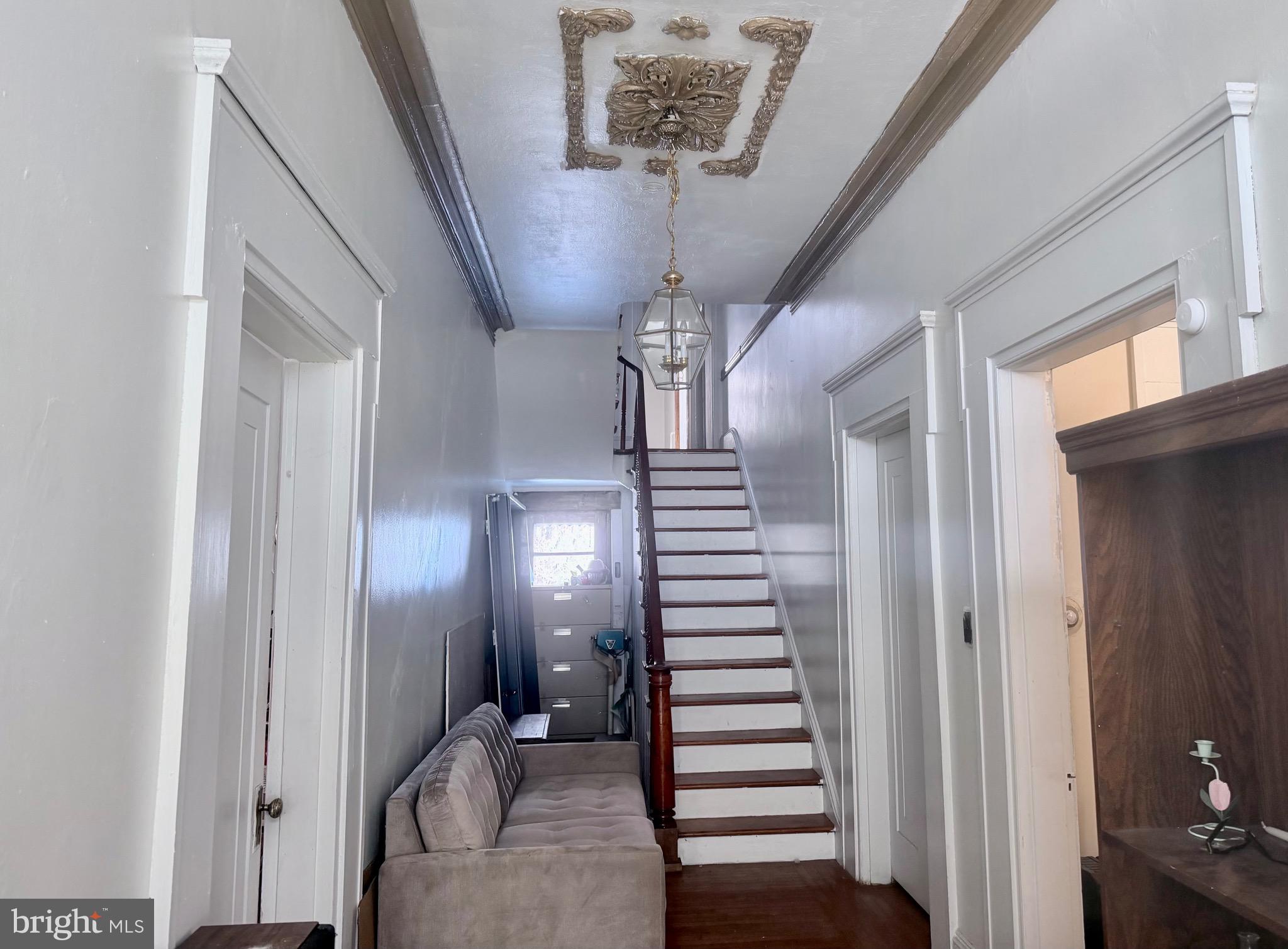 95 Mill Street Mount Holly, NJ 08060 - Photo 8 of 15 a view of entryway and hall with wooden floor