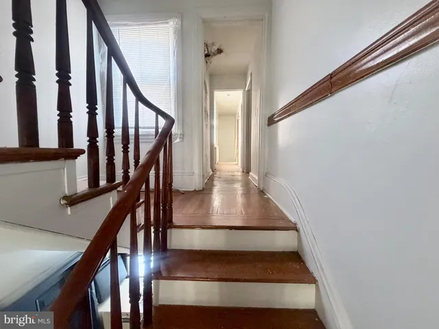a view of a hallway with front door