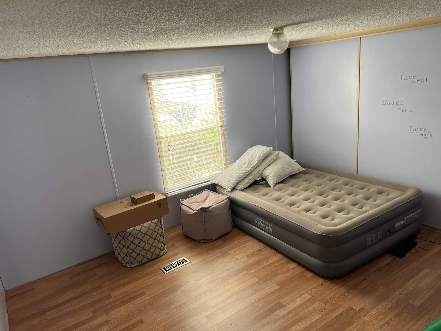 240 Whitney Road, Unit 21 Lake Zurich, IL 60047 - Photo 2 of 13 a bedroom with bed and window